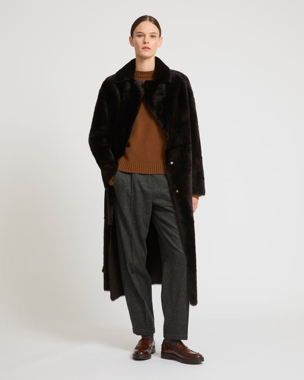 Long reversible belted shearling coat