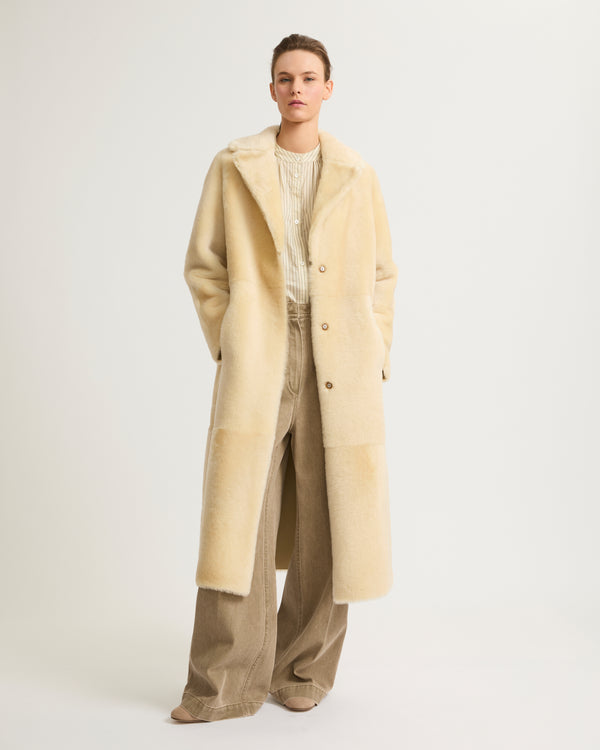 Long reversible belted shearling coat