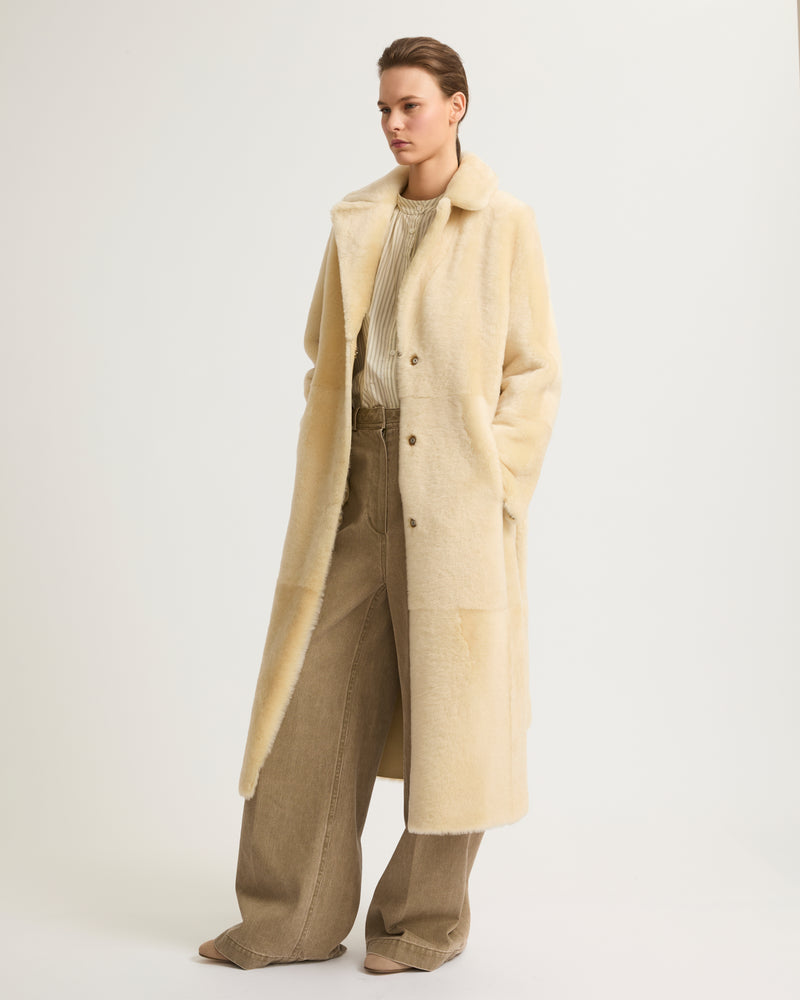 Long reversible belted shearling coat