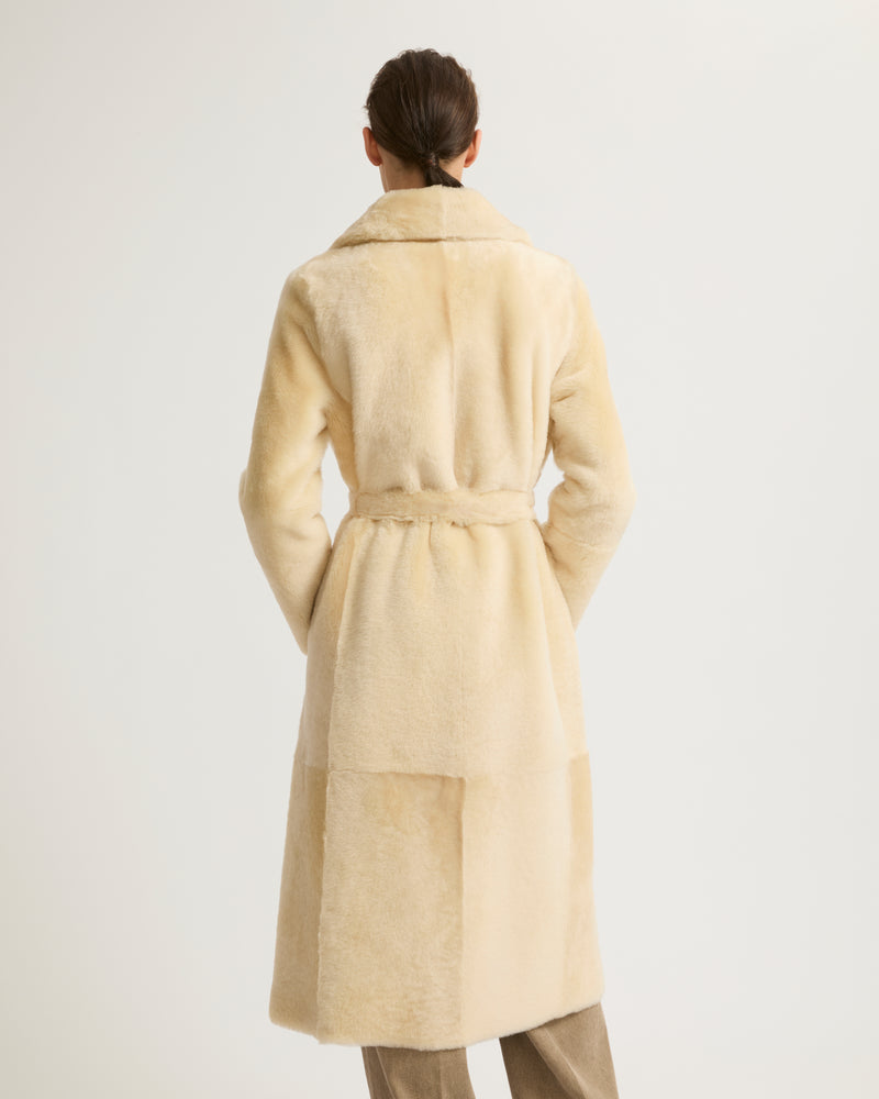 Long reversible belted shearling coat