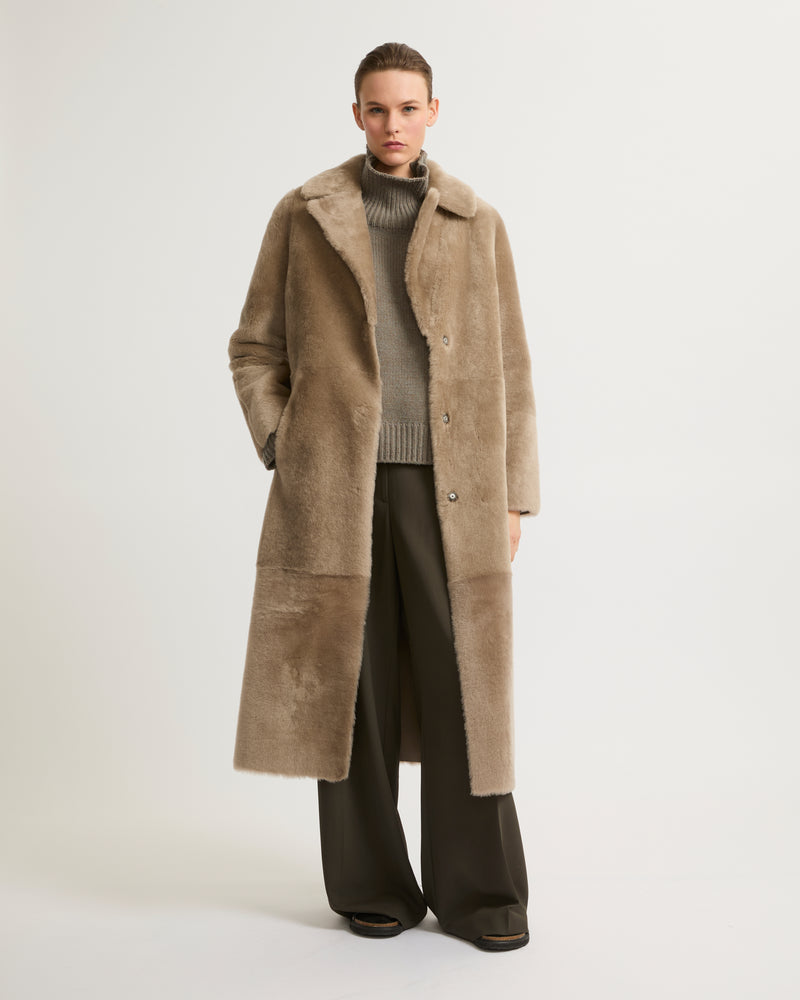 Long reversible belted shearling coat