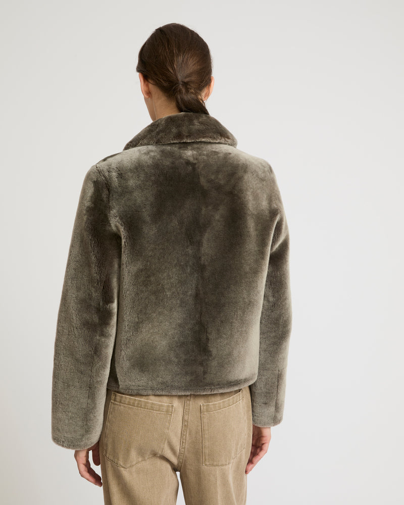 Short reversible jacket in merino lambskin