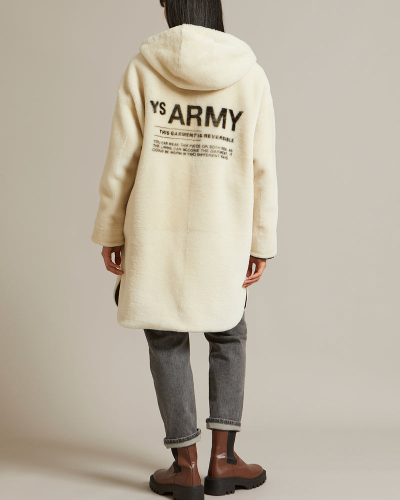 Parka réversible en tissu technique déperlant et peau lainée mérinillo