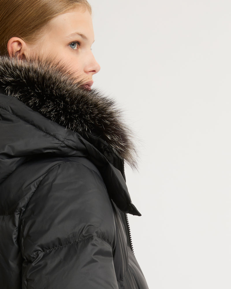 A line down jacket in water-repellent technical fabric with fox fur collar