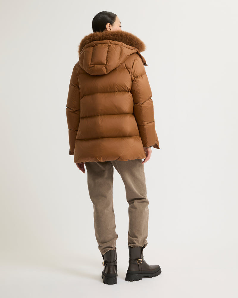 A line down jacket in water-repellent technical fabric with fluffy lambswool collar