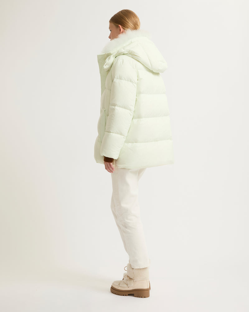 A line down jacket in water-repellent technical fabric with fluffy lambswool collar