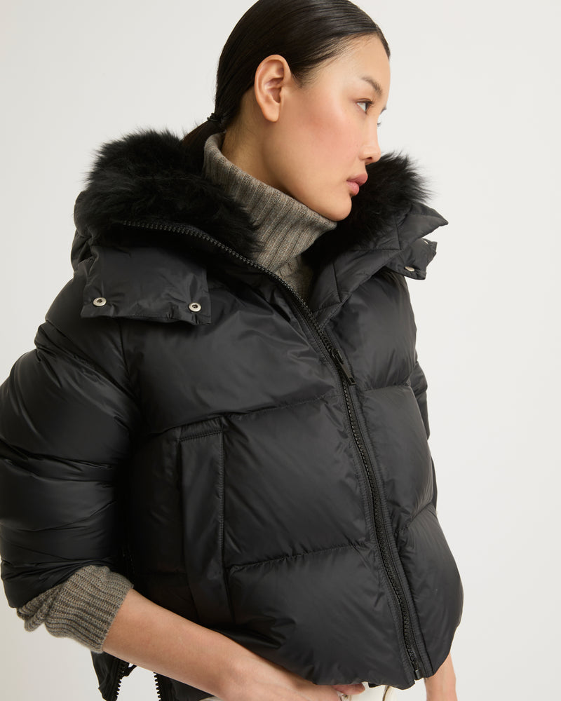 Short "A" line down jacket in water-repellent technical fabric with fluffy lambswool collar