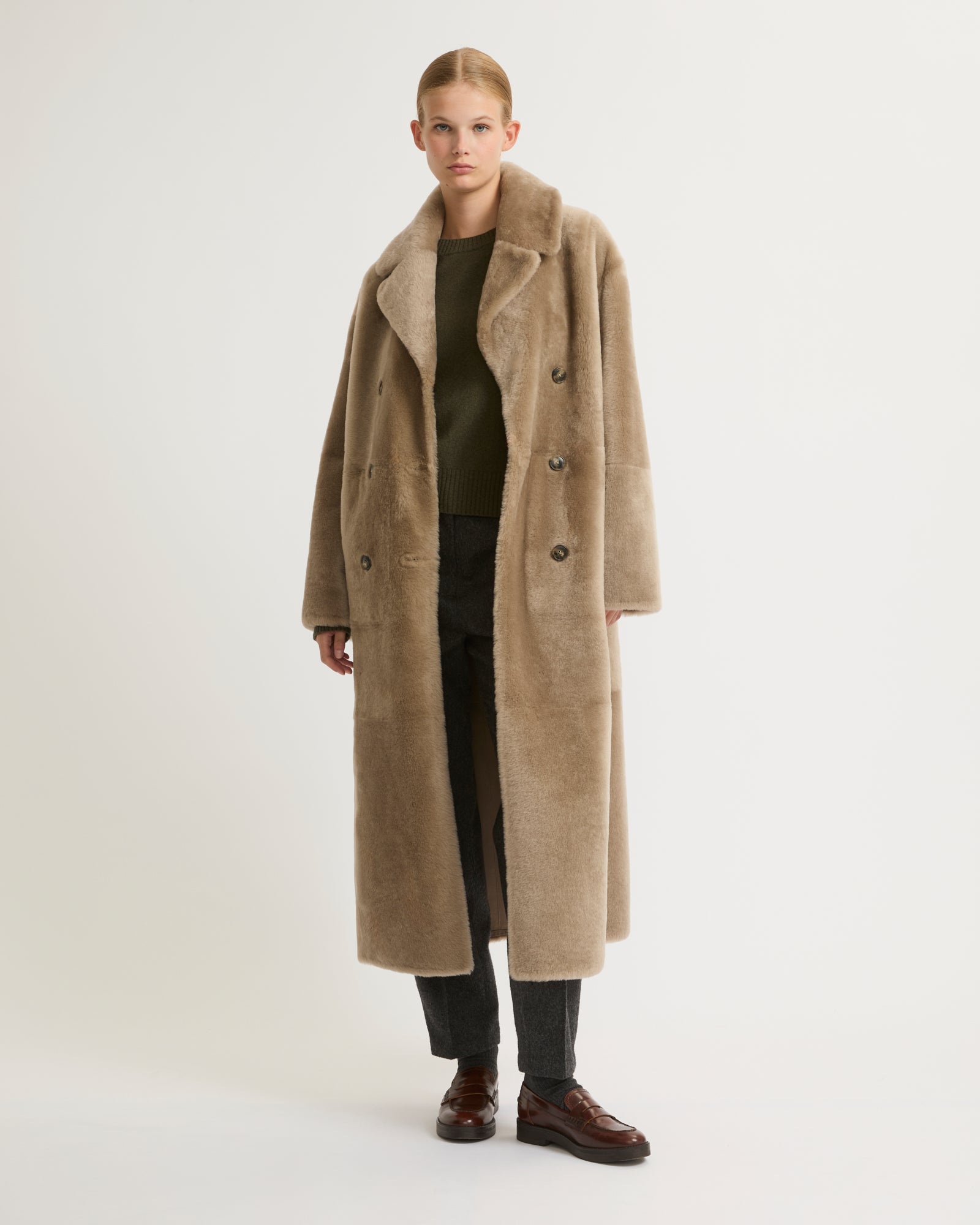 Manteau long peau retournée femme sale