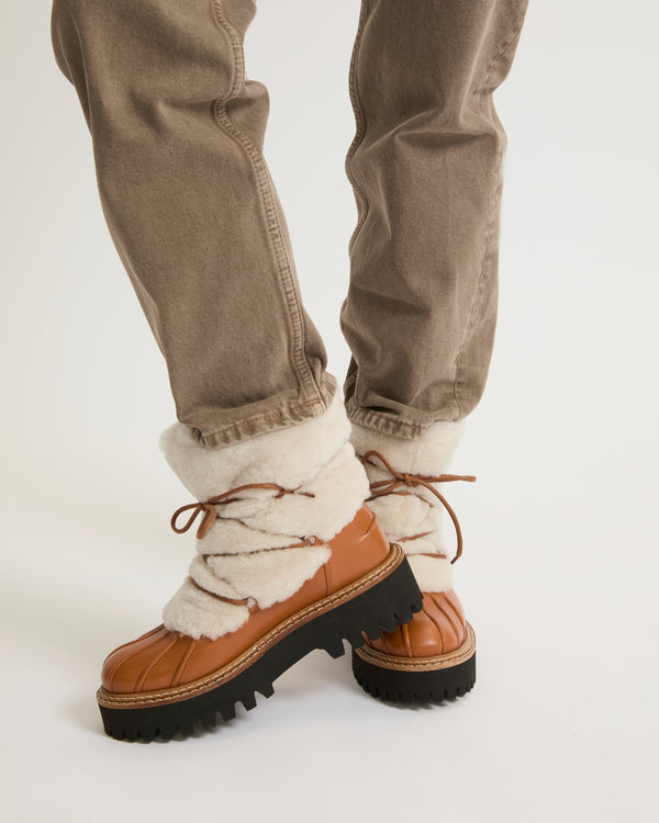 Lace-up mid-length boots in ironed Merino