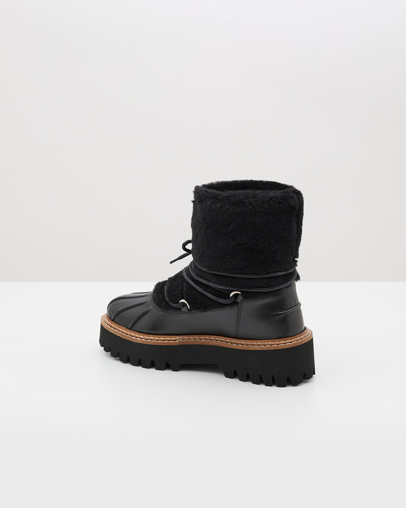 Lace-up mid-length boots in ironed Merino