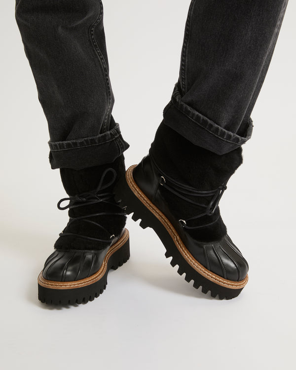 Lace-up mid-length boots in ironed Merino