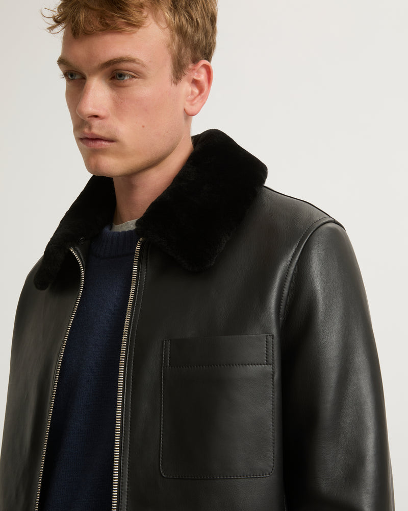 Leather jacket with shearling collar