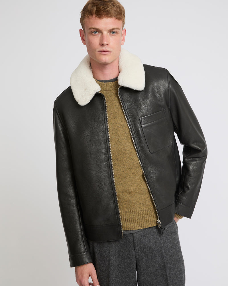 Leather jacket with shearling collar