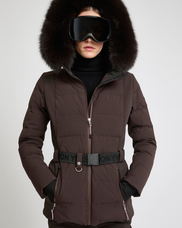 Mixed fabric belted skiwear jacket with fox fur trim