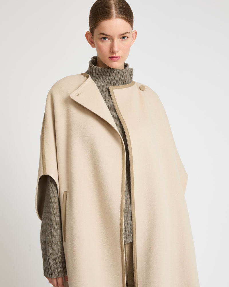 Double-sided cashmere blend cape with button details