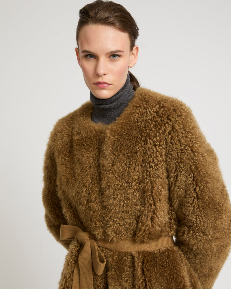 Coat in merino knit and lambskin