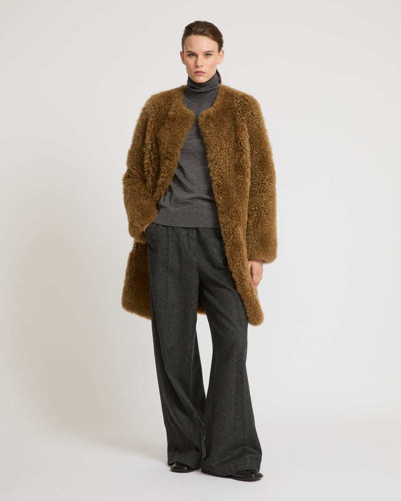 Coat in merino knit and lambskin