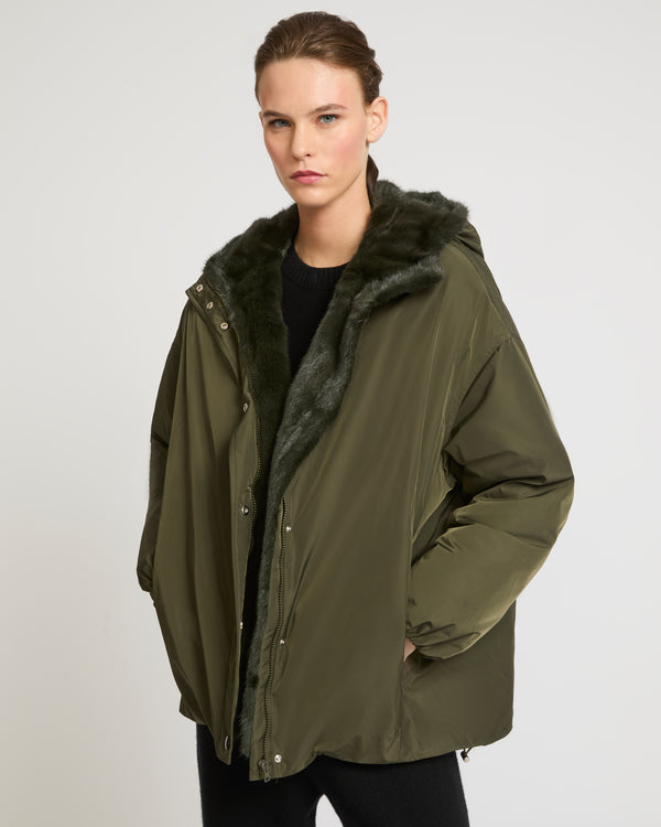 Hooded down jacket in technical fabric and mink fur