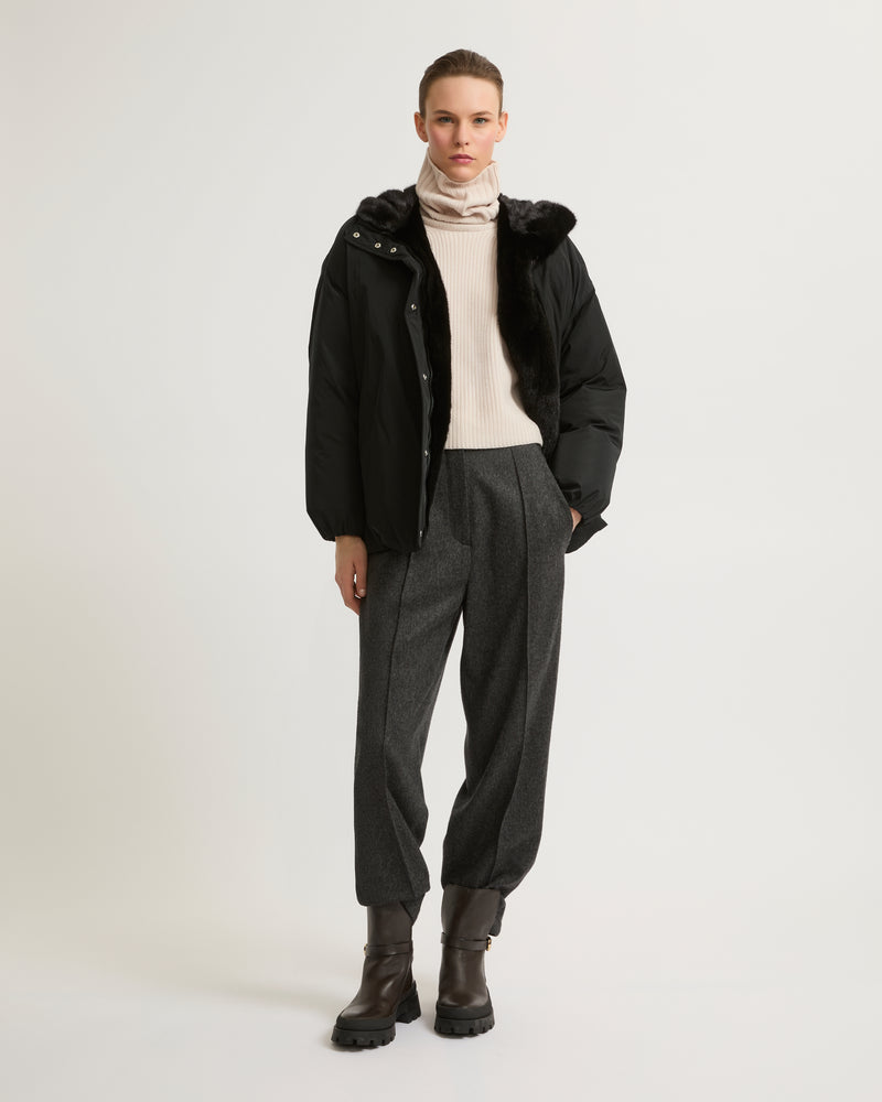 Hooded down jacket in technical fabric and mink fur