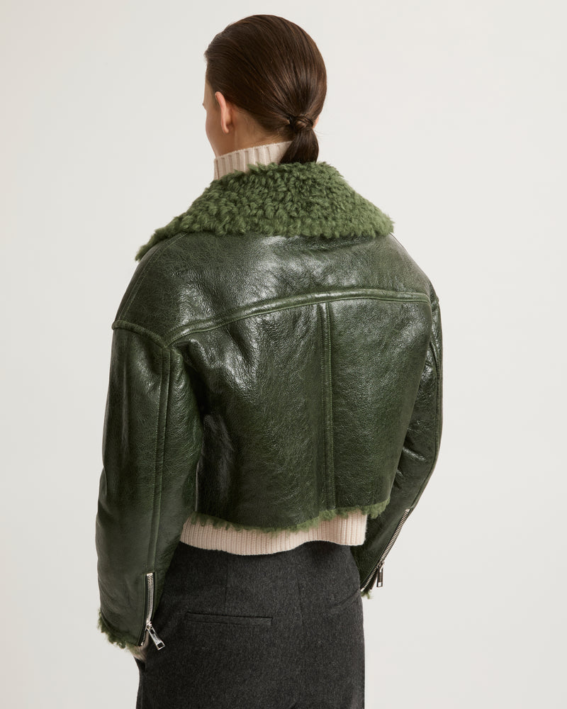 Cropped biker jacket in patent merino