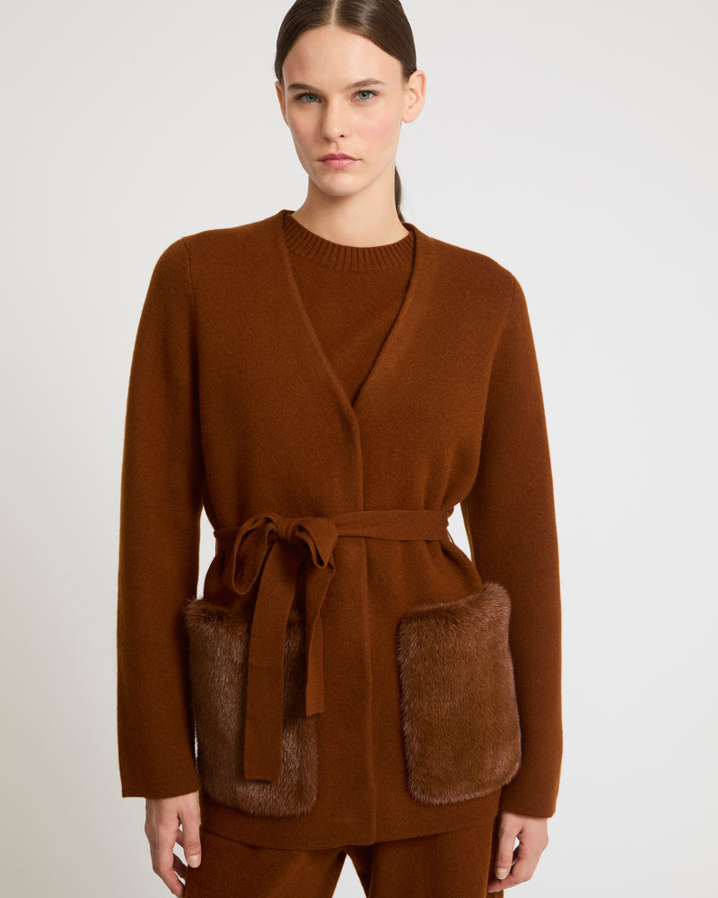 Belted knit and mink jacket