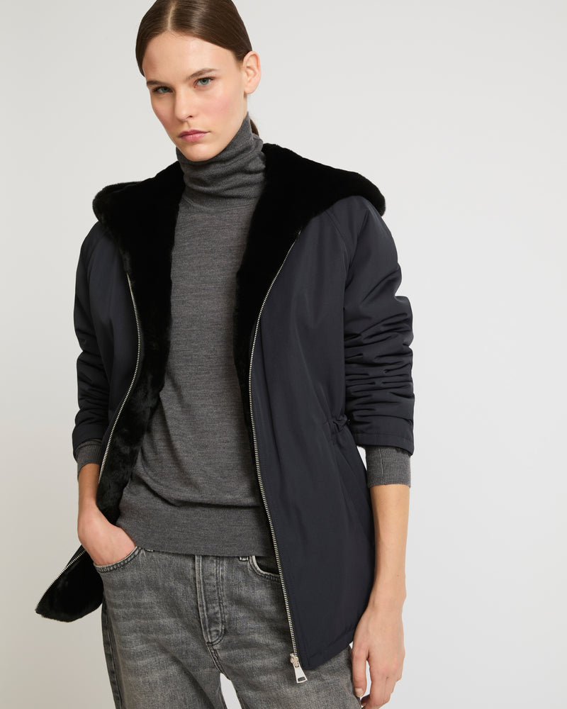 Reversible hooded jacket in rex fur and technical fabric