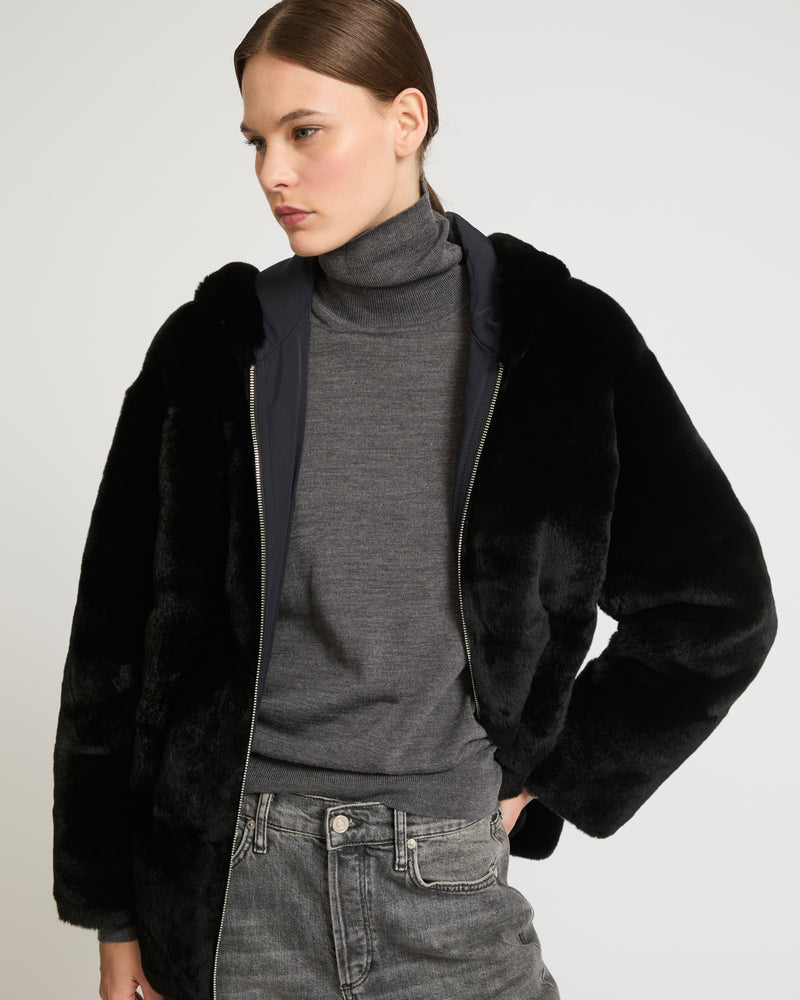 Reversible hooded jacket in rex fur and technical fabric